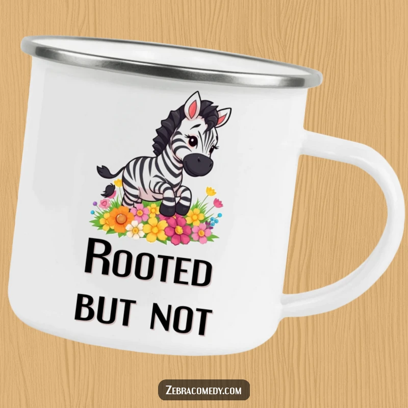 Funny zebra comically slipping on colorful flowers, a rugged and amusing camping mug for outdoor fun.