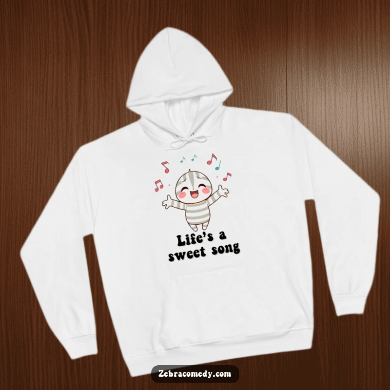 Funny hoodie with a striped character joyfully embracing floating musical notes, offering comfort and a harmonious blend of warmth and humor.