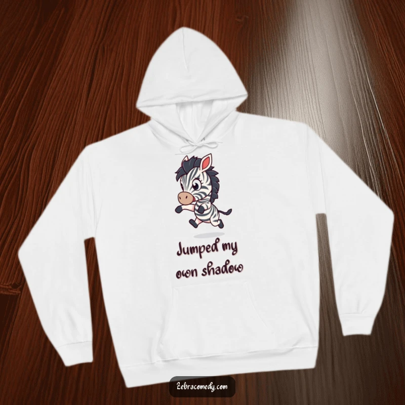 Funny Hoodie: A zebra character recoils in comical shock, leaping backward with wide eyes, offering a humorous statement piece.