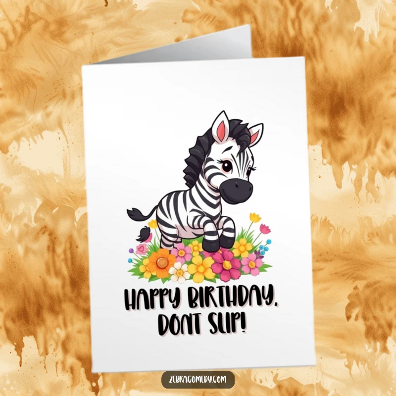 Funny Free Printable Birthday Card: A zebra character comically slips and slides on a patch of colorful flowers.