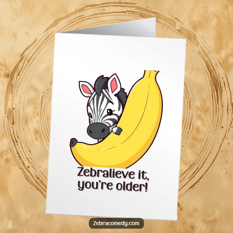 Funny Free Printable Birthday Card: Zebra peeking curiously around a giant novelty banana, ready to party humorously.