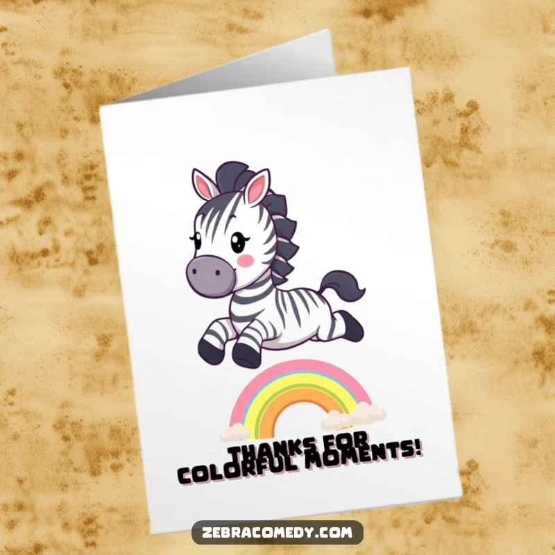 Funny Free Printable Thank You Card: A happy Zebra gracefully leaps over a bright rainbow, conveying thanks with whimsical charm.
