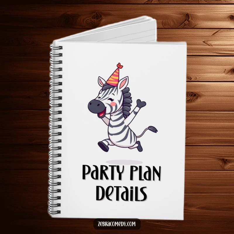 Funny Zebra Notebook showing a zebra leaping with joy and wearing a party hat, perfect for event planning.