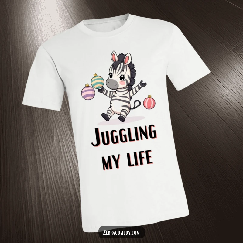 Funny Zebra T-Shirt: A zebra comically tripping while juggling striped baubles, humorous apparel for the accident-prone.