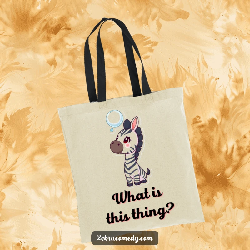 Funny zebra tote bag with a curious zebra looking up at a floating bubble, ideal for carrying essentials with a touch of whimsy.