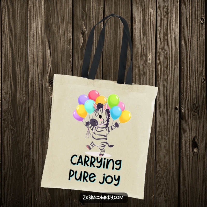 Funny Tote Bag showcasing a delighted zebra character dancing animatedly with a big bunch of colorful balloons, a stylish and humorous accessory.
